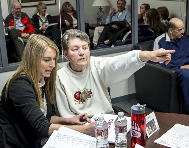 UM student and Big Sky Aphasia Program volunteer Jenny Silvernale works with Helga Vinso, a patient at the clinic. 